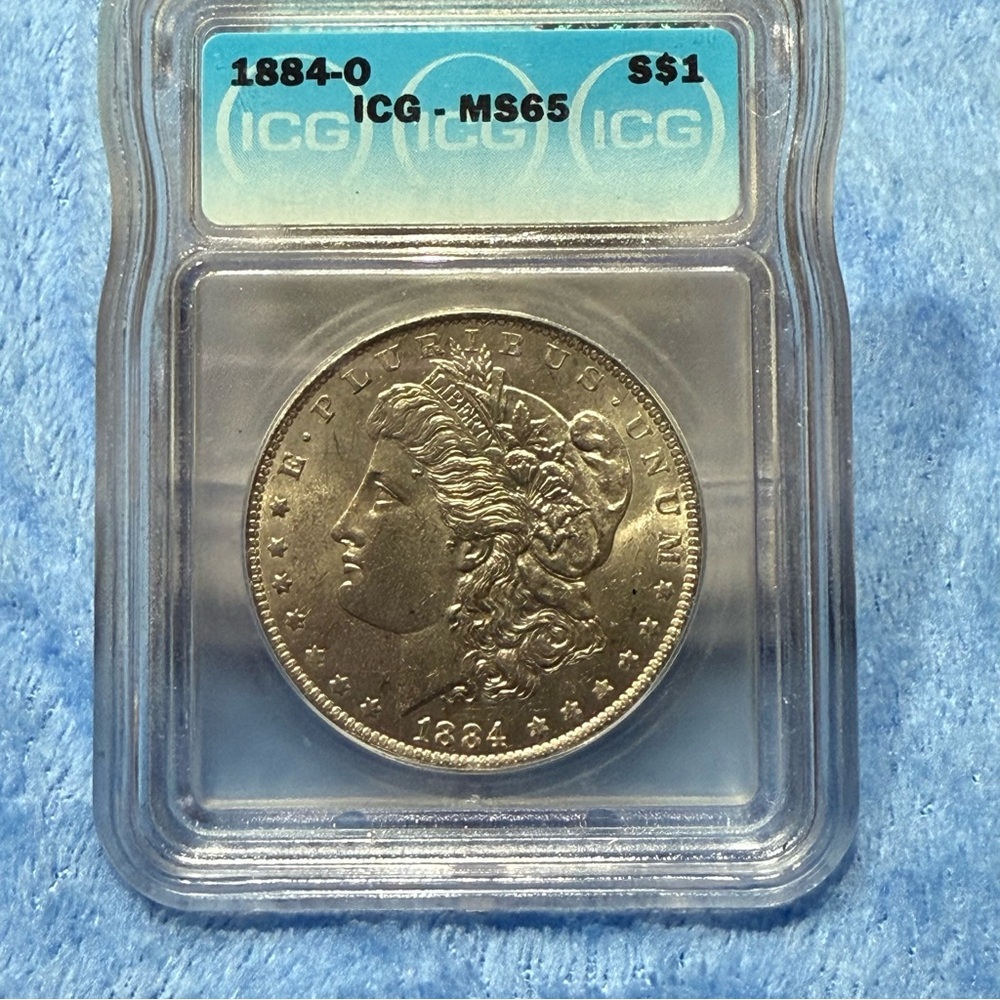 🔥SUPER RARE 1884 O MORGAN SILVER DOLLAR GRADED MS65!! 🔥